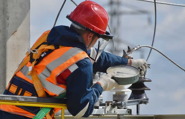 lineman working on high voltage cables
